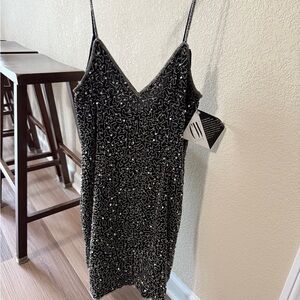 Elegant Black and Silver Beaded and Sequin Patterned Mini Dress